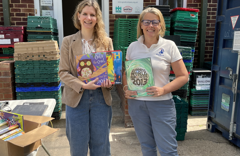 Emma delivers books to Epsom Food Bank