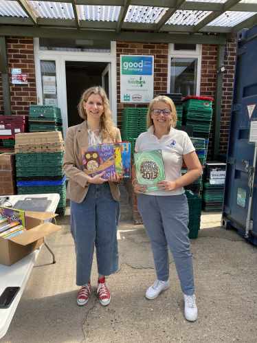 Emma delivers books to Epsom Food Bank